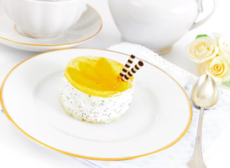 Sweets: Cream Cakes on Plate.