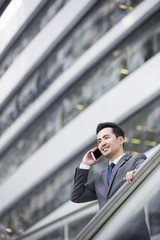 Fototapeta premium Businessman talking on the phone