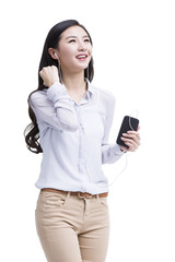 Young woman enjoying music on the phone