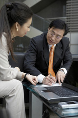 Businesspeople Sitting In A Meeting