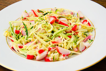 Dietary Salad with Crab Sticks, Cucumber and Cheese