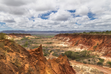 Fototapeta na wymiar Red Tsingy landscape with clouds in Antsiranana, Madagascar