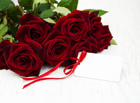 Red roses and greeting card