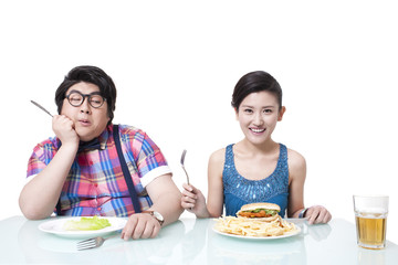 Different diet between overweight man and young woman