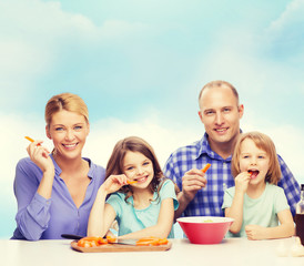 happy family with two kids eating at home