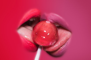Obraz premium Female lips and lollipop