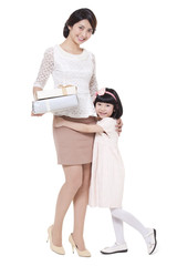 Fototapeta premium Happy mother and daughter with gift box