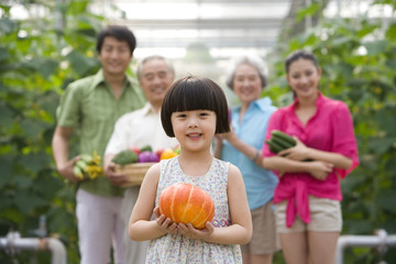 Fototapeta premium Family gardening in modern farm