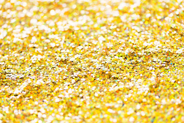 golden glitter or yellow sequins background
