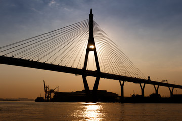 Fototapeta na wymiar Silhouette Of Bridge At Twilight Time