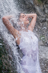 Model shower under waterfall, Calabria - Italy