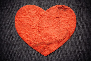 red heart on a dark wall, valentine background