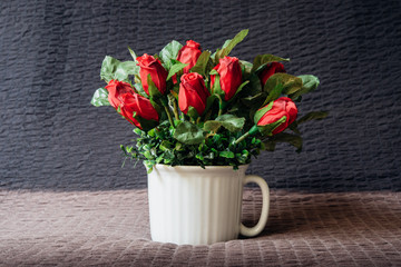 Still life with a bouquet of rose.