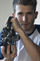 Portrait of a man with a camcorder