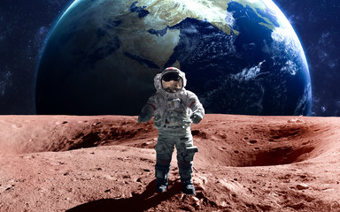 Fototapeta na wymiar Brave astronaut at the spacewalk on the mars. This image elements furnished by NASA.