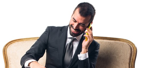 Businessman talking to mobile