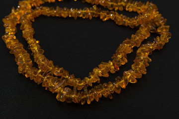 Obraz premium Amber necklace of small stones