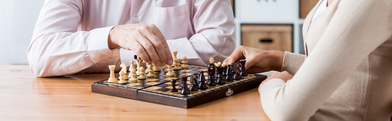 Playing chess with elder patient