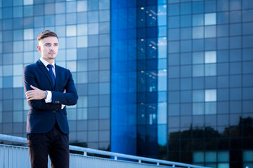 Fototapeta premium Young businessman posing