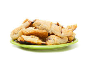 A plate of sweet cookies with lemon jam isolated on white background