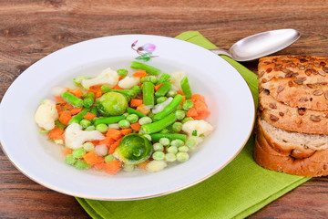 Soup with Cauliflower, Brussels Sprouts, Green Beans, Peas, Carr
