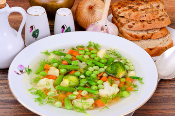 Soup with Cauliflower, Brussels Sprouts, Green Beans, Peas, Carr