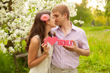 Obraz premium wedding couple in spring park garden
