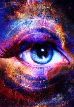 Woman Eye and cosmic space with stars and circle light.  Flah in space, abstract color background, eye contact.