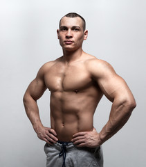 Fototapeta premium Handsome strong athletic man