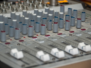 Fototapeta premium part of an audio sound mixer with buttons