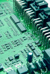 Closeup of Printed Circuit Board with Mounted Components.