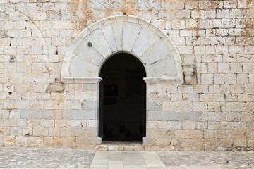 arched door in the facade