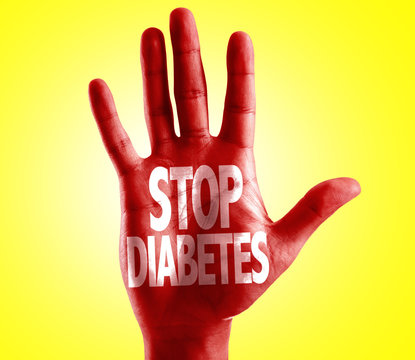 Stop Diabetes written on hand with yellow background