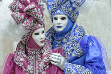 Man and woman with pink and blue