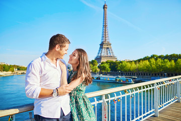 Young romantic couple spending their vacation in Paris, France