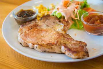 Juicy and tasty grilled pork steak