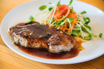 Juicy and tasty grilled pork steak