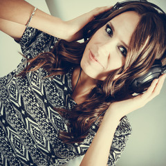 woman in headphones listening music mp3 relaxing