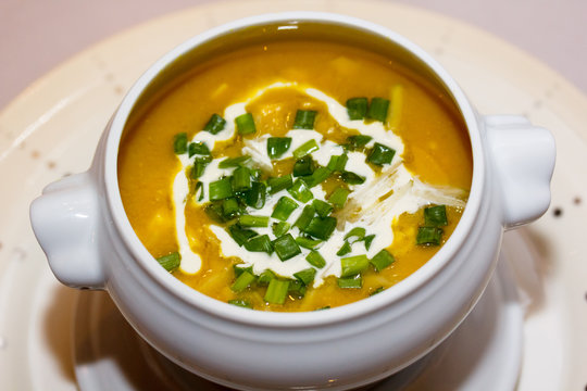 Cream soup of lentils with green onions and yogurt.