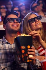 Obraz premium Young couple in 3D movie