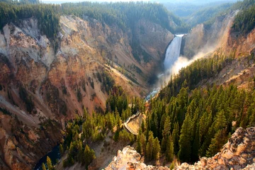 Foto op Canvas Lower Falls - Sunlight illuminates the spray as the Yellowstone River crashes over the Lower Falls in Yellowstone's Grand Canyon. © Amanda Mortimer