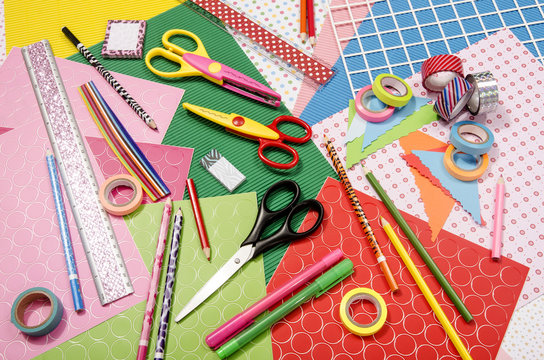 Arts and craft supplies. Color paper, pencils, different washi tapes, craft scissors.