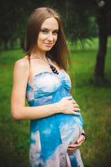Fototapeta premium Pregnant Couple on the park
