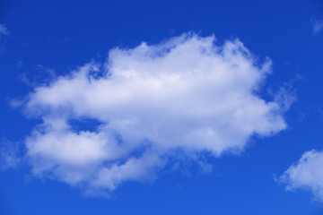 White clouds on blue sky background