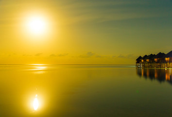 Fototapeta na wymiar Sunset on sea in Maldives