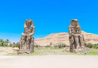 Egypt. Luxor. The Colossi of Memnon - two massive stone statues