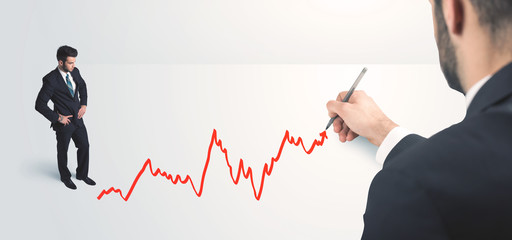 Business person looking at line drawn by hand