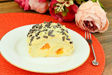 Biscuit and Cake with Mandarin and Whipped Cream.