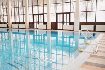 Fototapeta na wymiar Water polo gate in the indoor pool