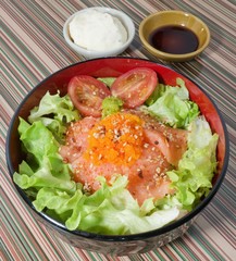 Bowl of Boiled Rice Topping with Salmon and Vegetable
